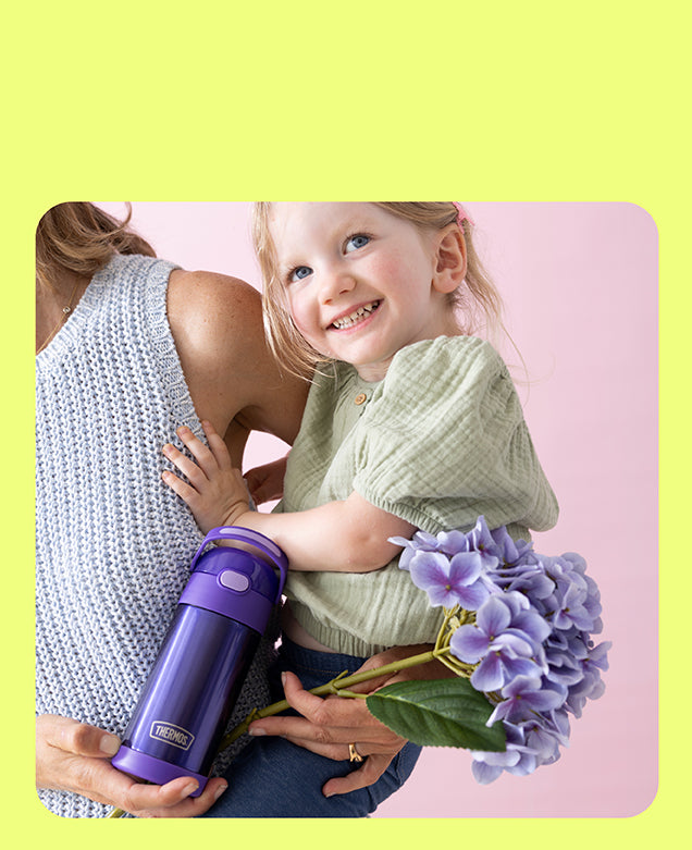 Woman holding young girl and a purple FUNtainer water bottle