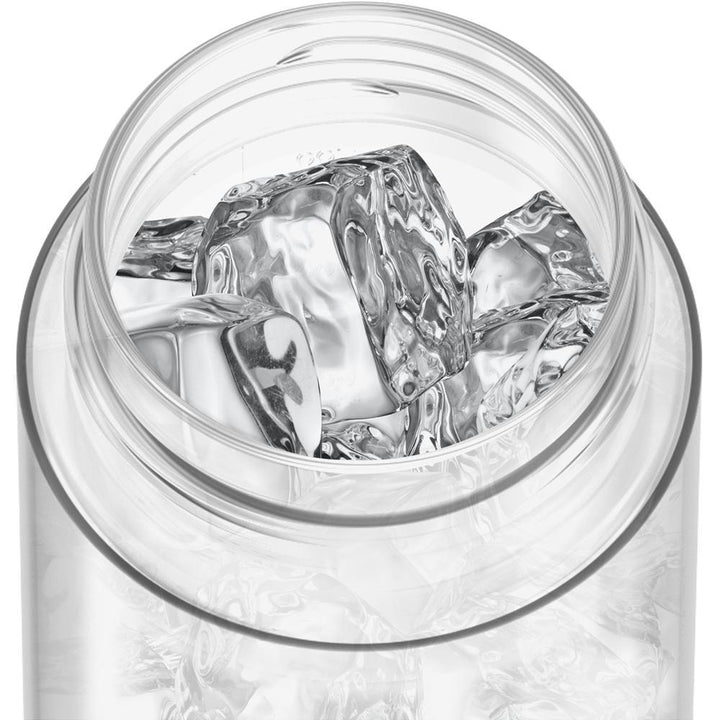 Thermos® Icon™ water bottle in Ultra Pink — shown filled with ice, demonstrating insulation