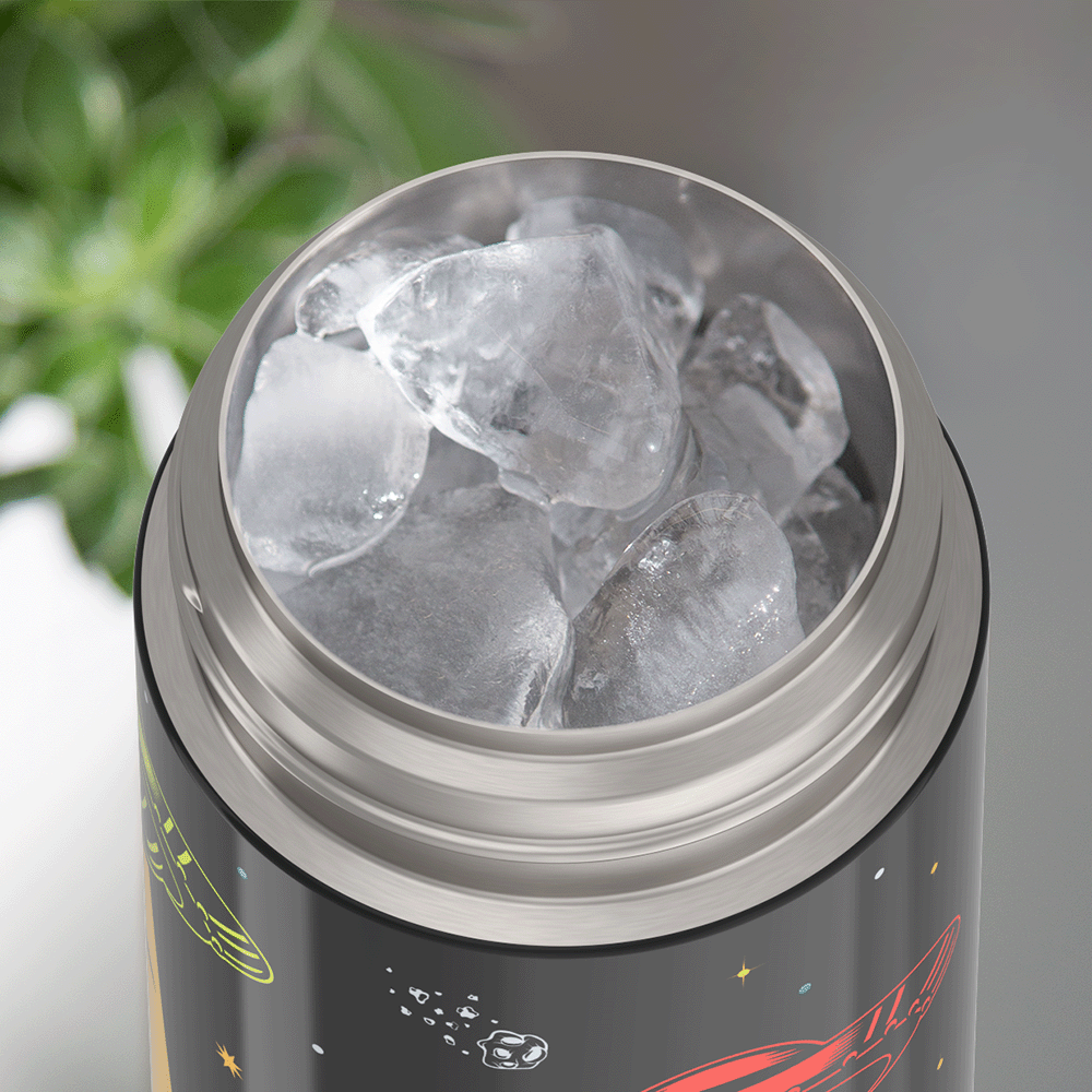 Thermos® 12oz FUNtainer® water bottle in Jungle Kingdom — shown filled with ice, demonstrating insulation