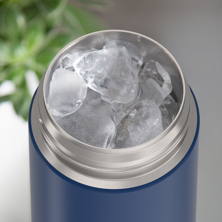 Thermos® 16oz FUNtainer® water bottle in Lightning Bolt Girl — shown filled with ice, demonstrating insulation