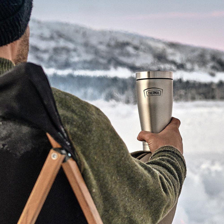 Thermos® 16oz Icon™ tumbler in Sunset Pink — lifestyle photo in use