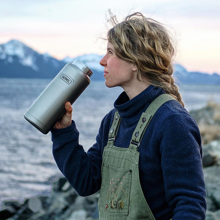 Thermos® 40oz Icon™ water bottle in Matte Stainless Steel — lifestyle photo in use